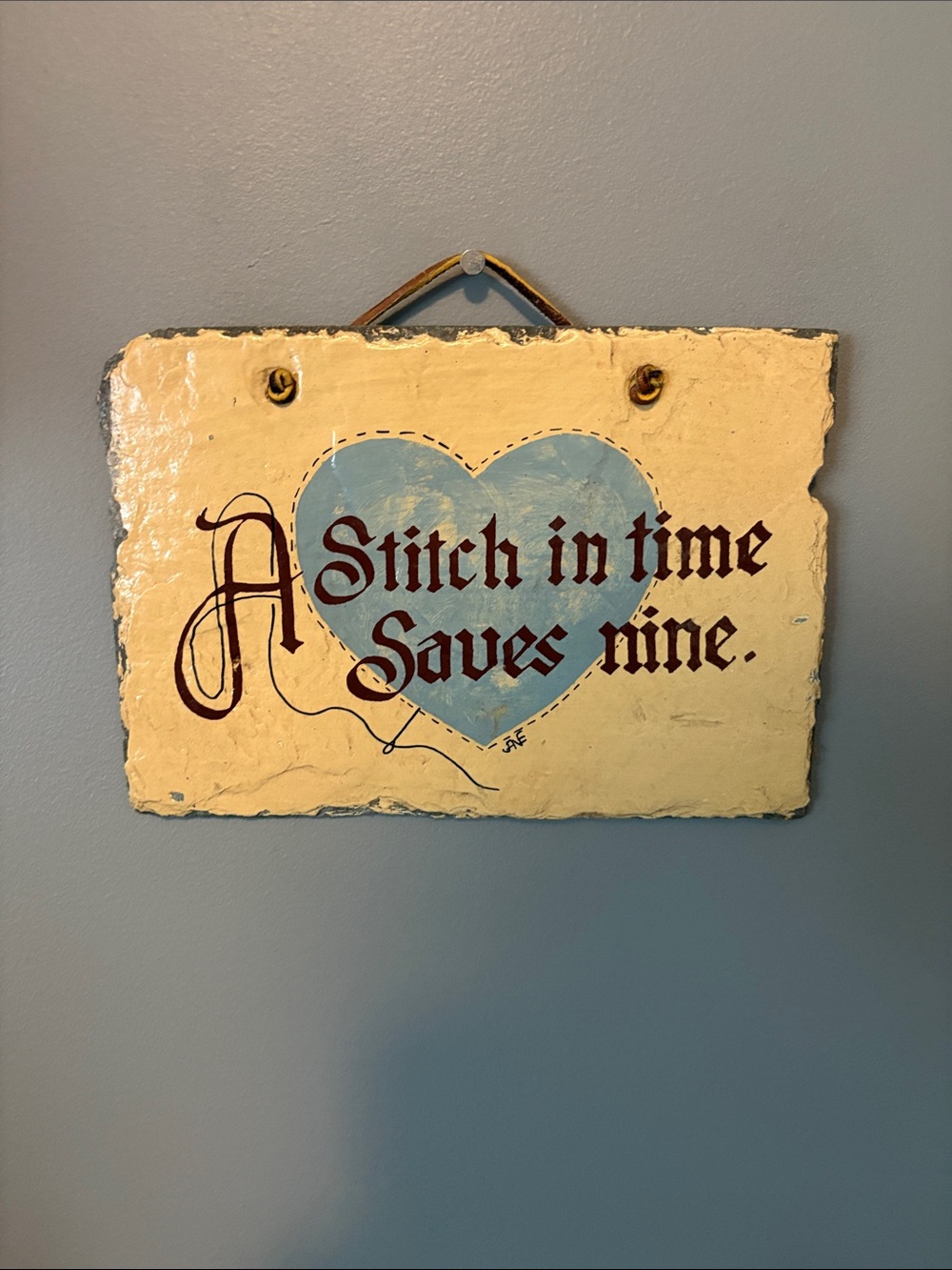 Hand-Painted Cream and Blue Wall Plaque - 'A Stitch in Time Saves Nine'